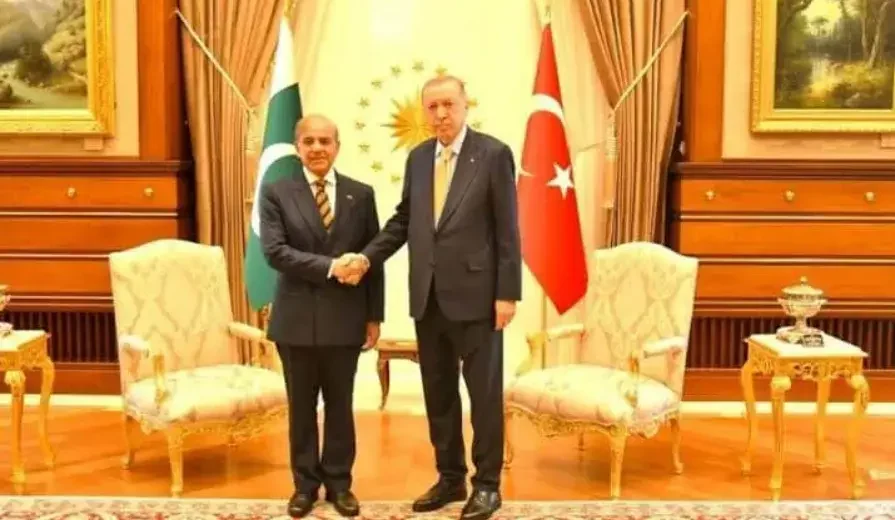 PM Shehbaz Sharif and Turkish President Recep Tayyip Erdogan shake hands during a bilateral meeting in Ankara focused on Pakistan-Turkiye relations