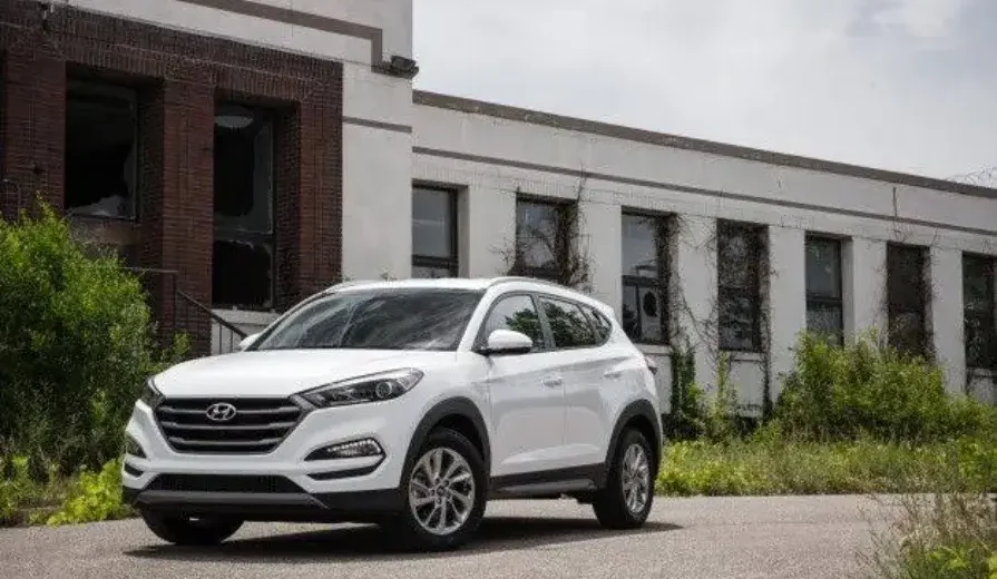 Hyundai Tucson SUV on display with fine print overlay, symbolizing the CCP's Rs 25 million fine for misleading introductory pricing in Pakistan.