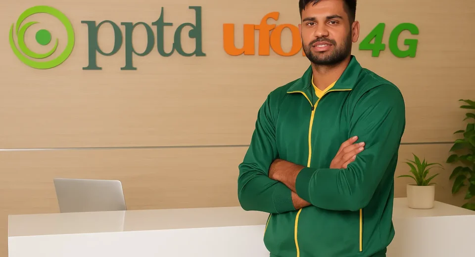 A young South Asian male athlete in sportswear stands confidently against a plain background, representing strength and national pride.