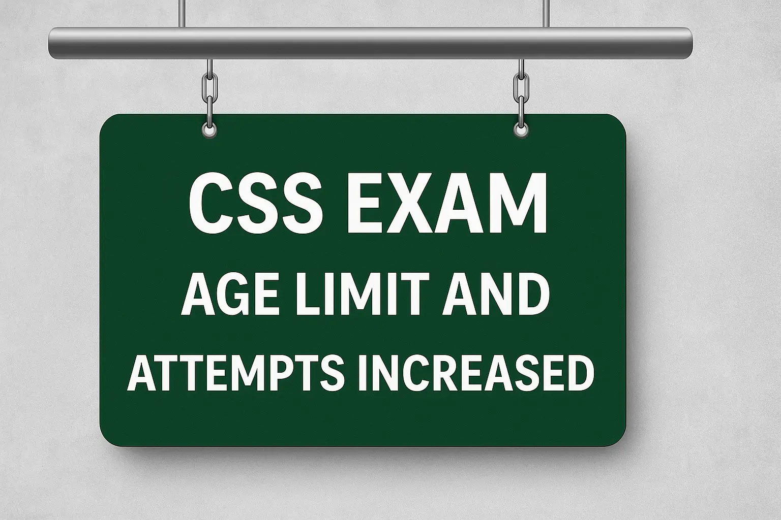 A digital photograph showing a formal indoor setting with a dark-themed backdrop, where a South Asian man in business attire is seated at a desk, appearing focused.